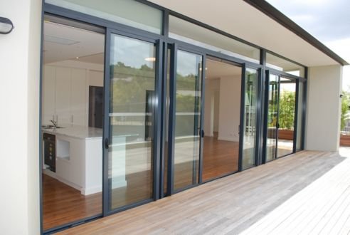 Architectural aluminum facade systems used in modern commercial buildings and large construction projects. Aluminum building facade structures support large glass panels while maintaining strong aluminum frame systems. Aluminum facade systems provide modern aesthetics, structural strength and long-term performance for exterior building envelopes.