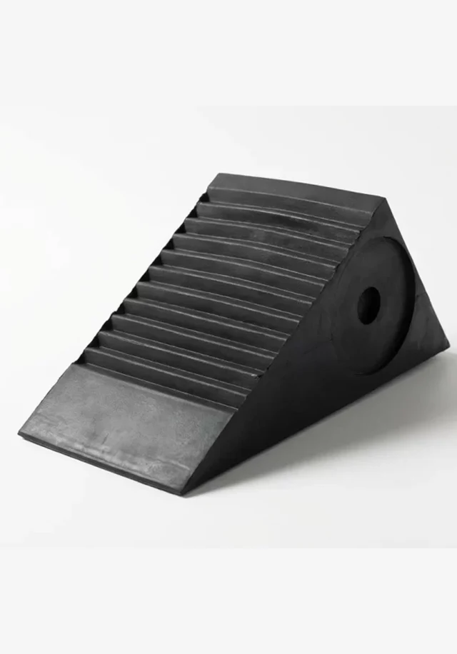industrial rubber wedge component used for positioning, support and load stabilization in construction systems and machinery applications requiring durable rubber materials